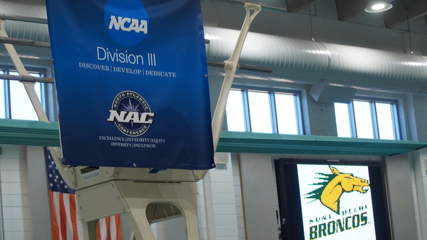 sign with screen in background