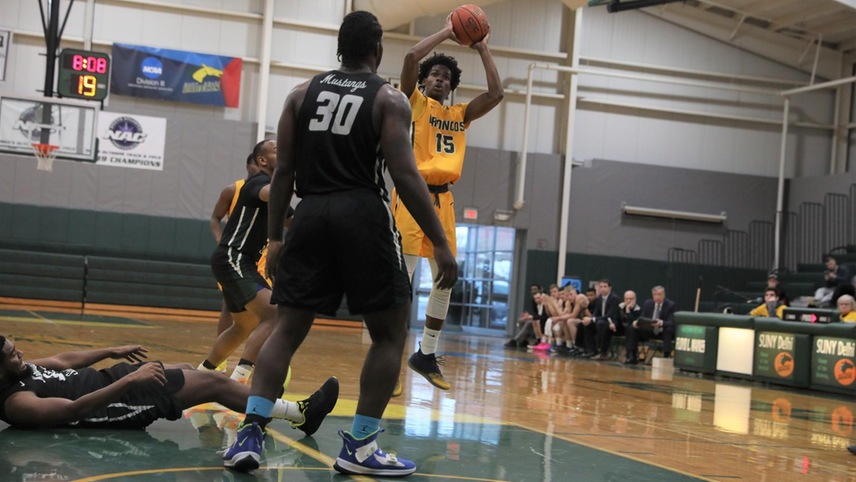Mavenson Therneus going up for a jump shot.