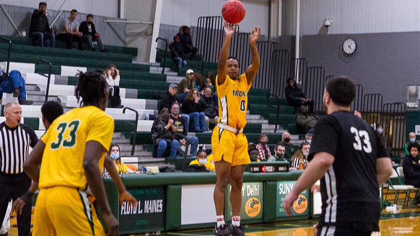 basketball player attempting a 3-point shot