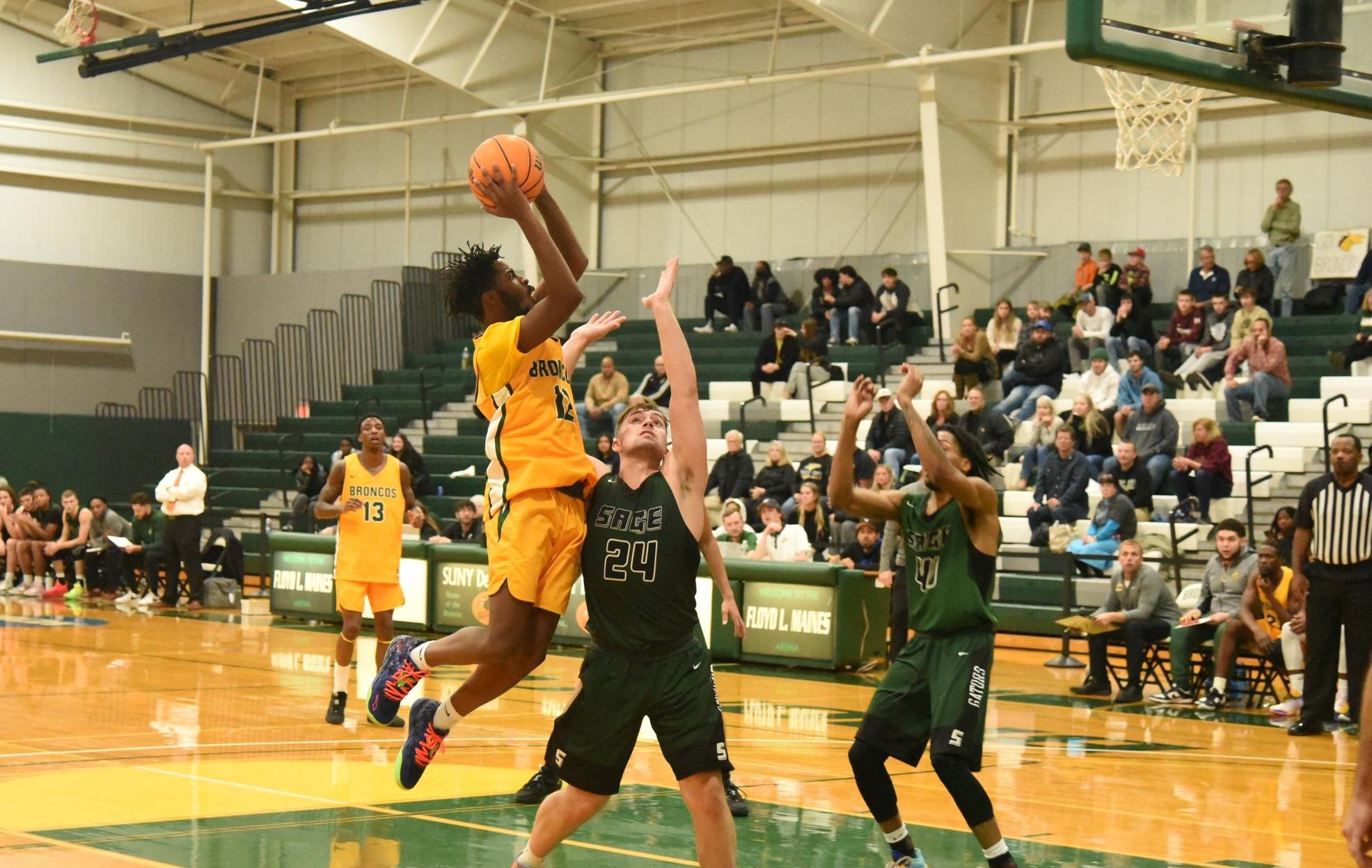 Senior Mavenson Therneus joins 1,000 Point Club as Broncos Fall in Opening Game of Utica Classic