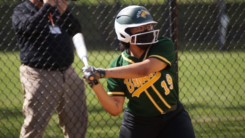 softball player batting