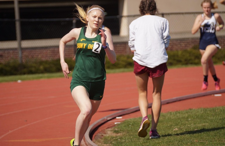 Katerina Salcedo making a turn on her way to a new school record in the 800 meters. 