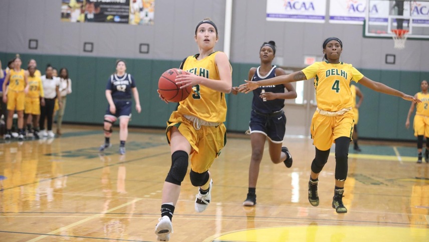 #3 Carissa Crandall driving for a breakaway layup.