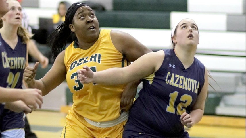 Diana Echols fights through a box out for a rebound.